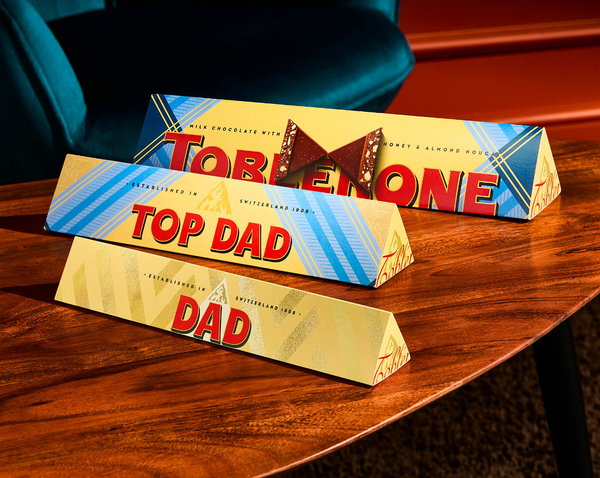 Toblerone Bar Hanging Over a yellow ledge.