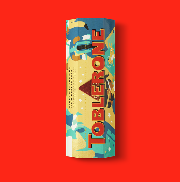 6 pack Toblerone in front of a Red background.