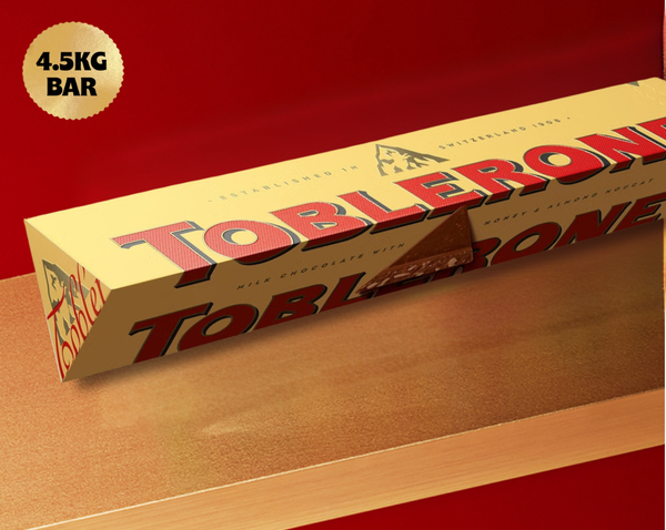 toblerone 4.5kg bar in front of red background