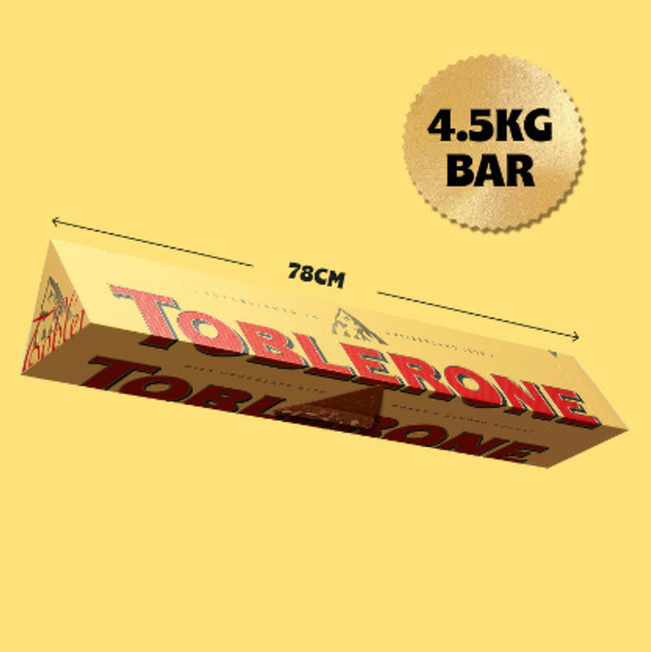 toblerone 4.5kg bar in front of red background