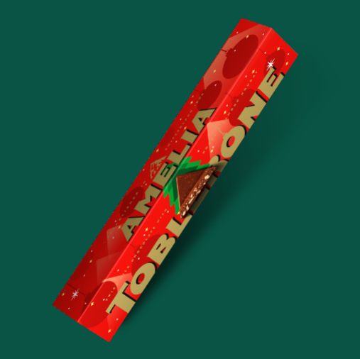 Personalised Toblerone Large 750g Bar in front of a green background