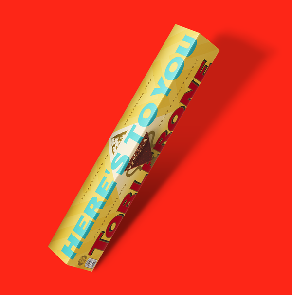 Personalised Toblereone Bar on Red Background.