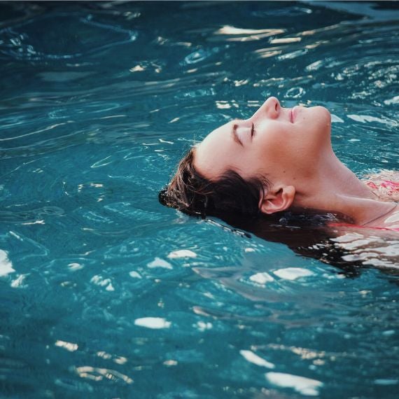 Woman swimming in the pool