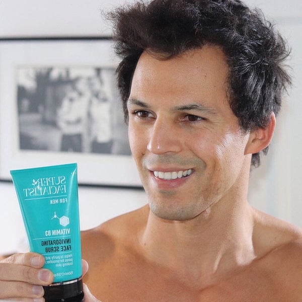 topless man holding super facialist for men invigorating face wash Visit Our Instagram