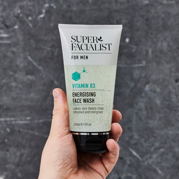 hand holding super facilalist for men Vitamin B energising face wash Visit Our Instagram