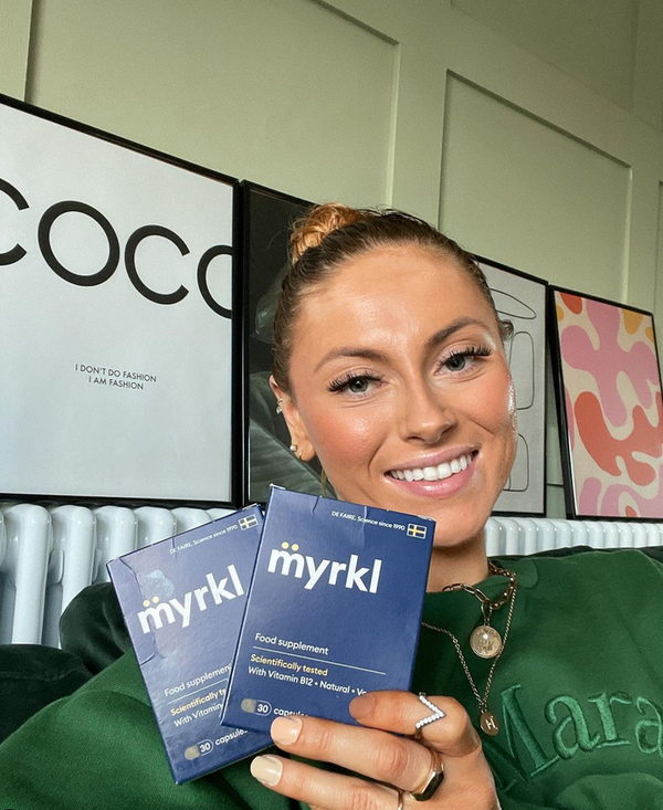Customer holding Myrkl product