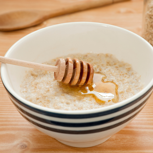 An image of porridge and honey in a bowl