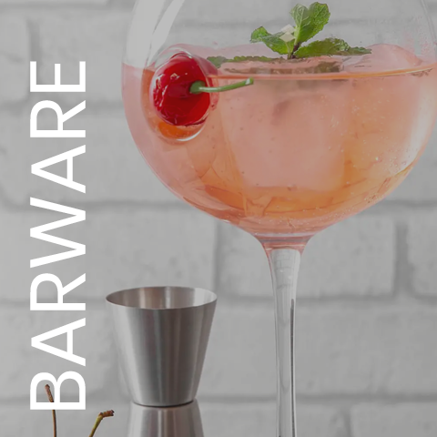 Cocktail style glass containing pink liquid representing barware gifts