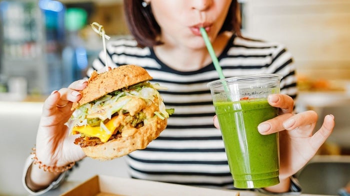 woman enjoying a vegan restaurant meal