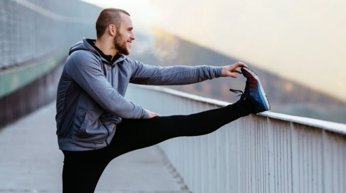 man stretching before exercise