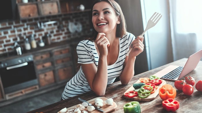 woman chopping vegetables