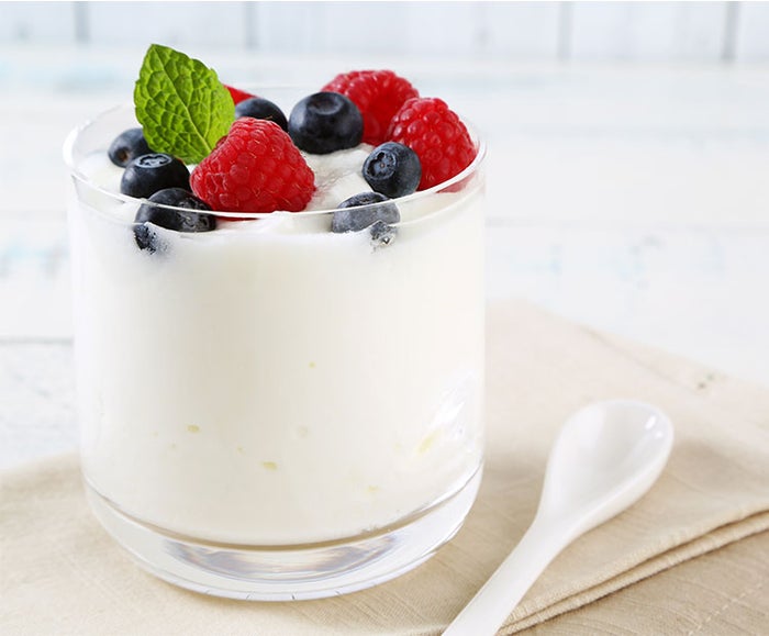 Yogurt-with-fruits-and-spoon-on-a-table-2 | Dermstore Blog