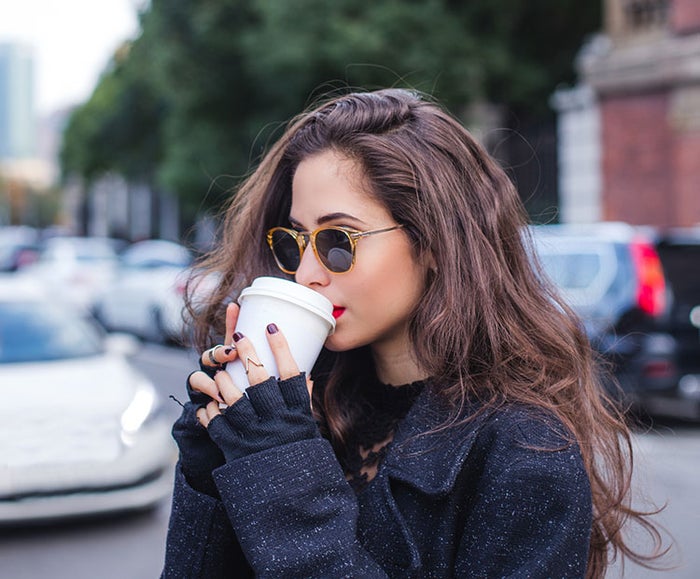 brunette drinking coffee 2 I Dermstore Blog