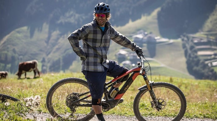 Cyclist poses on bike