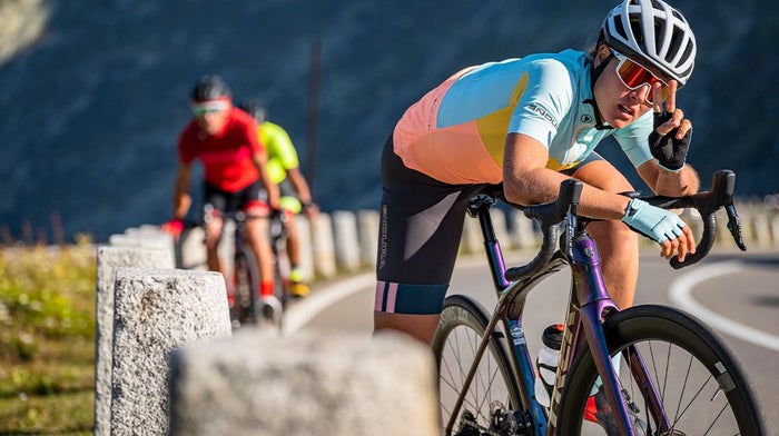 Endura cyclists throws up peace sign to the camera