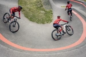 The Pump for Peace Racing Team warming up for racing on a pump track