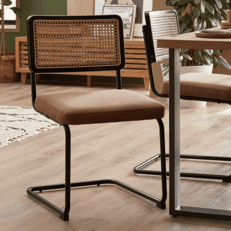 Brown table chair with weaved back and black metal structure.