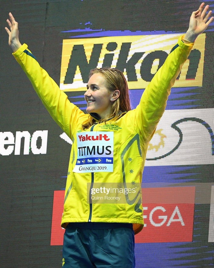 Ariarne poses on the winners' podium