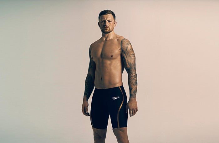 Adam Peaty stands in Speedo Fastskin shorts