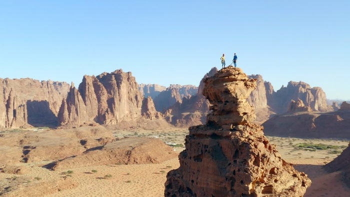 Duo pose atop Saudi rock tower