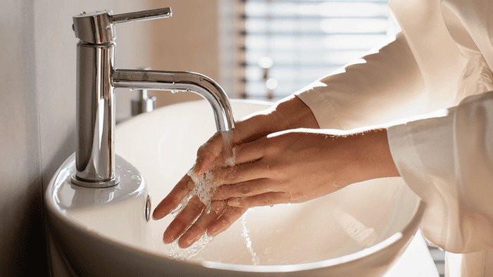 woman washing hands