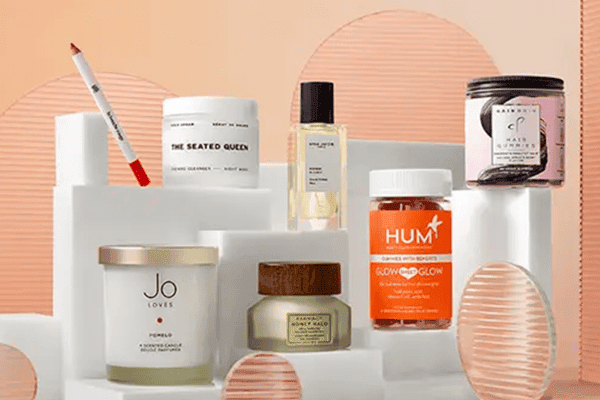 a collection of cult conscious beauty products against a peach background