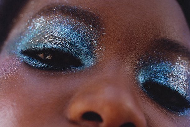 dark skinned model with metalic eyeshadow