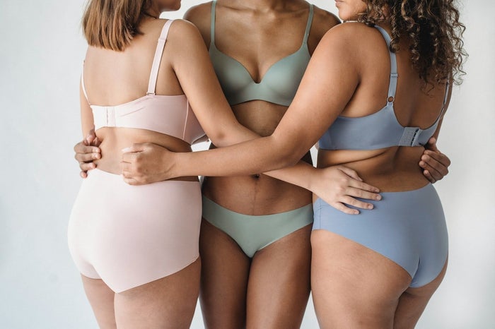 3 models of different sizes, races in pastle coloured underwear