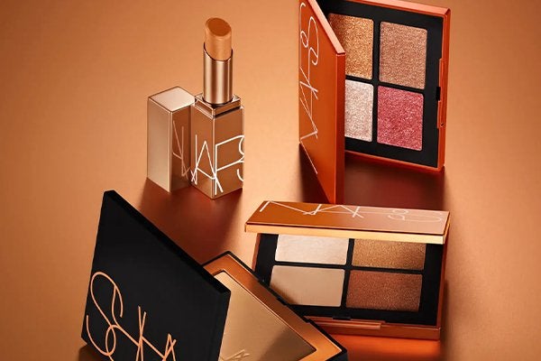 NARS turn up the heat collection against a gold background