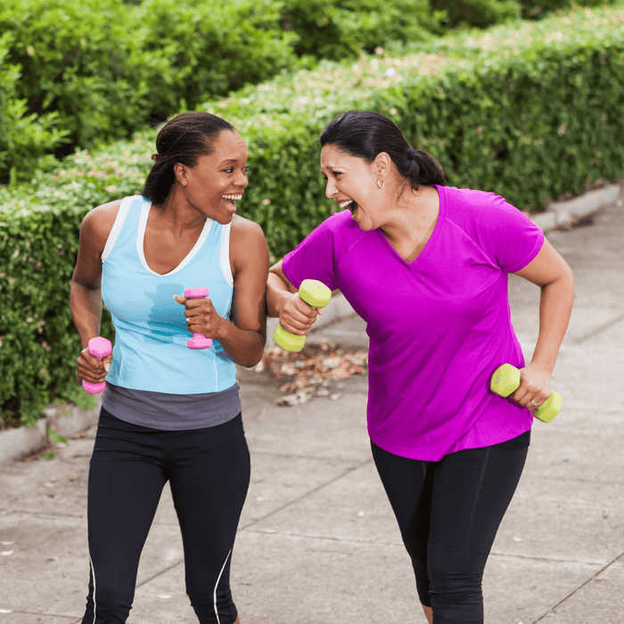 Two women exercising together 