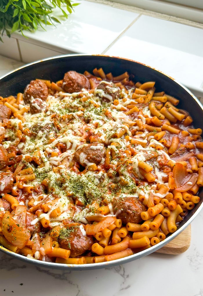 Cheesy meatball pasta in a pan