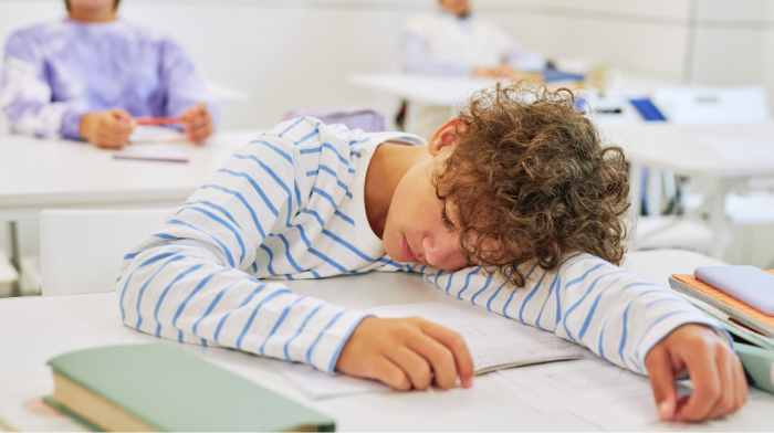 student sleeping at school