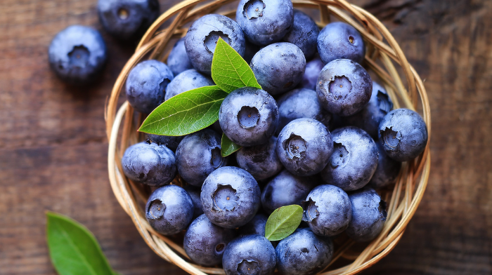 wicker basket with blueberries