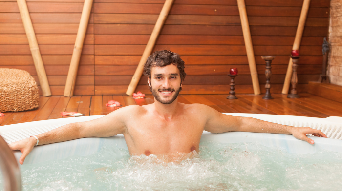 man smiling in ice bath