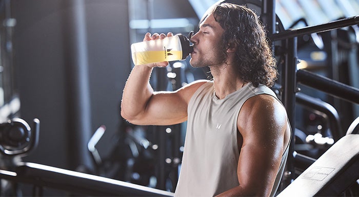 man drinking protein shake