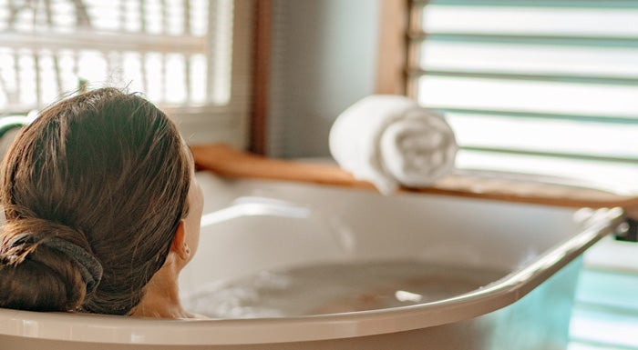 woman relaxing in a bath