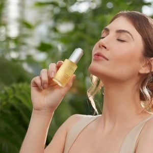 woman applying serum