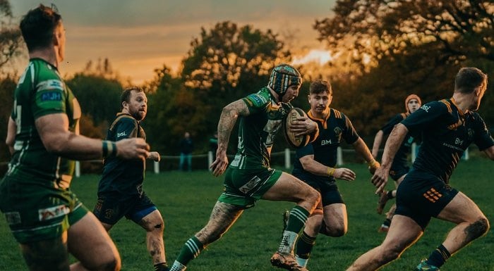 rugby player stretches 