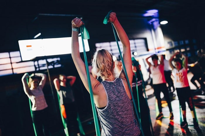 Group of women training with resistance bands