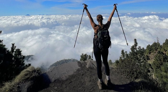 woman hiking on a volcano