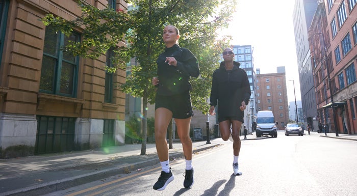 two people running