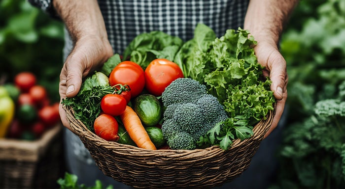 basket of leafy greens and veggies 