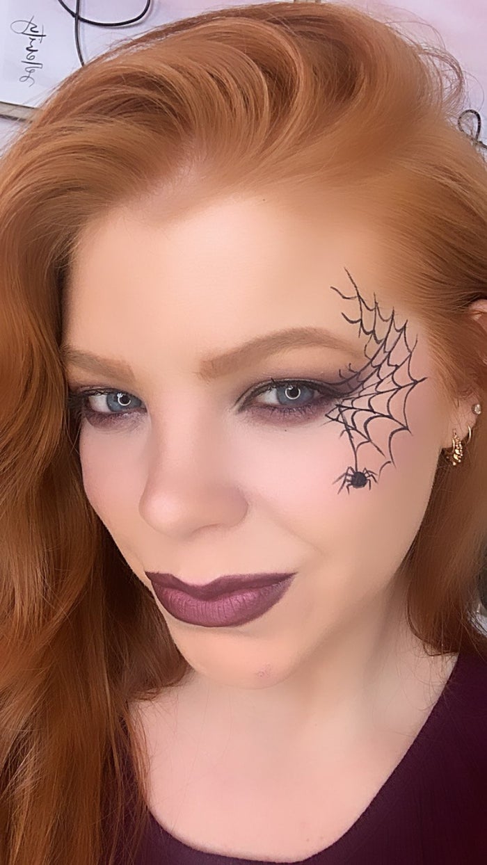Halloween makeup with spider web