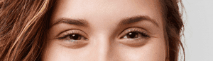 Model with down-turned eye shape