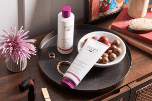 Two salon worthy products by Christophe Robin's Colour Shield range. Two white bottles with pink accents.