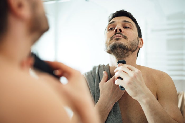 Man shaving his beard using Gillette ProGlide Styler Beard Trimmer | Gillette UK