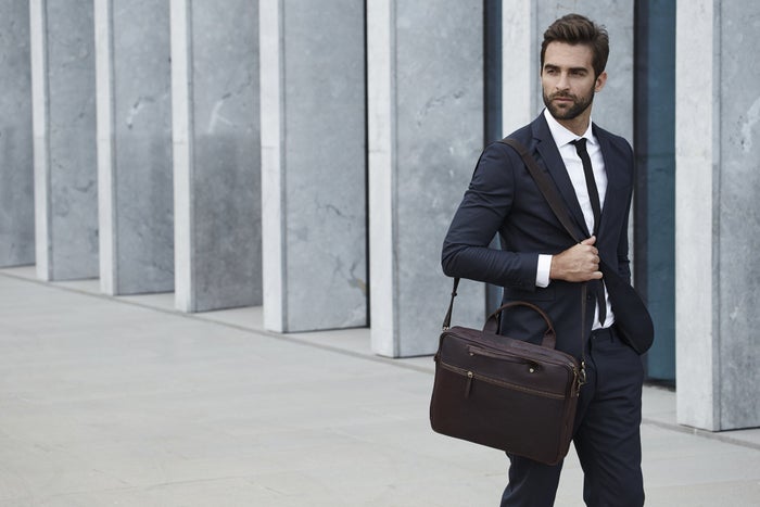 Sharply dressed man with a corporate beard 