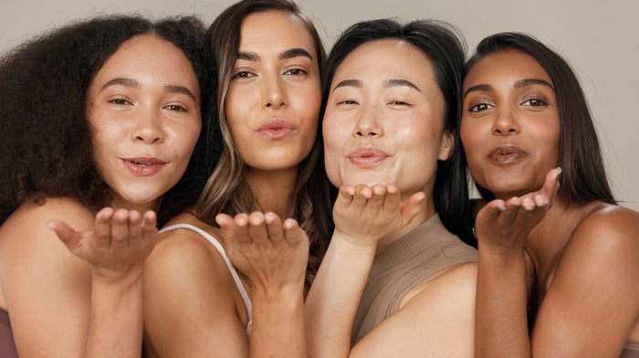 Four women blow kisses at the camera, thrilled after dermaplaning their, complexions | Venus UK