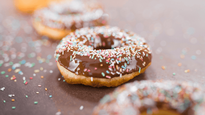 homemade vegan glazed donuts with sprinkles