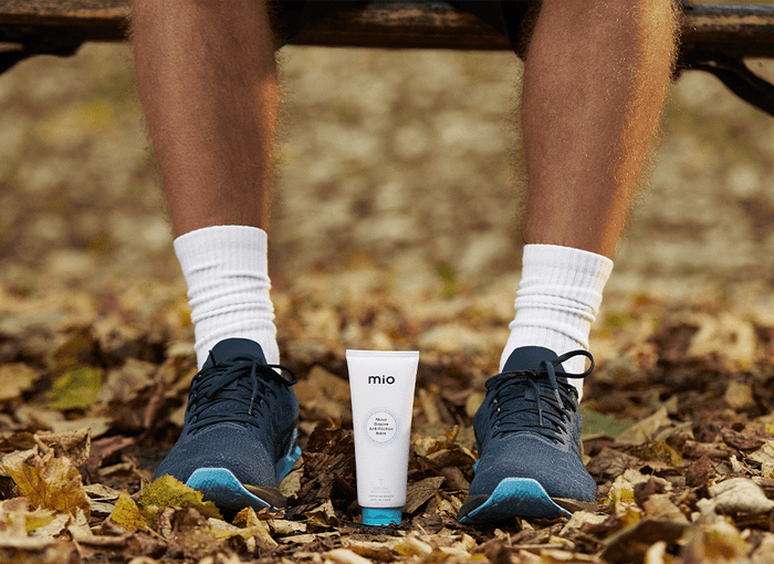 mio anti friction balm beside runners